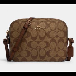 Crossbody Coach in Signature Canvas.